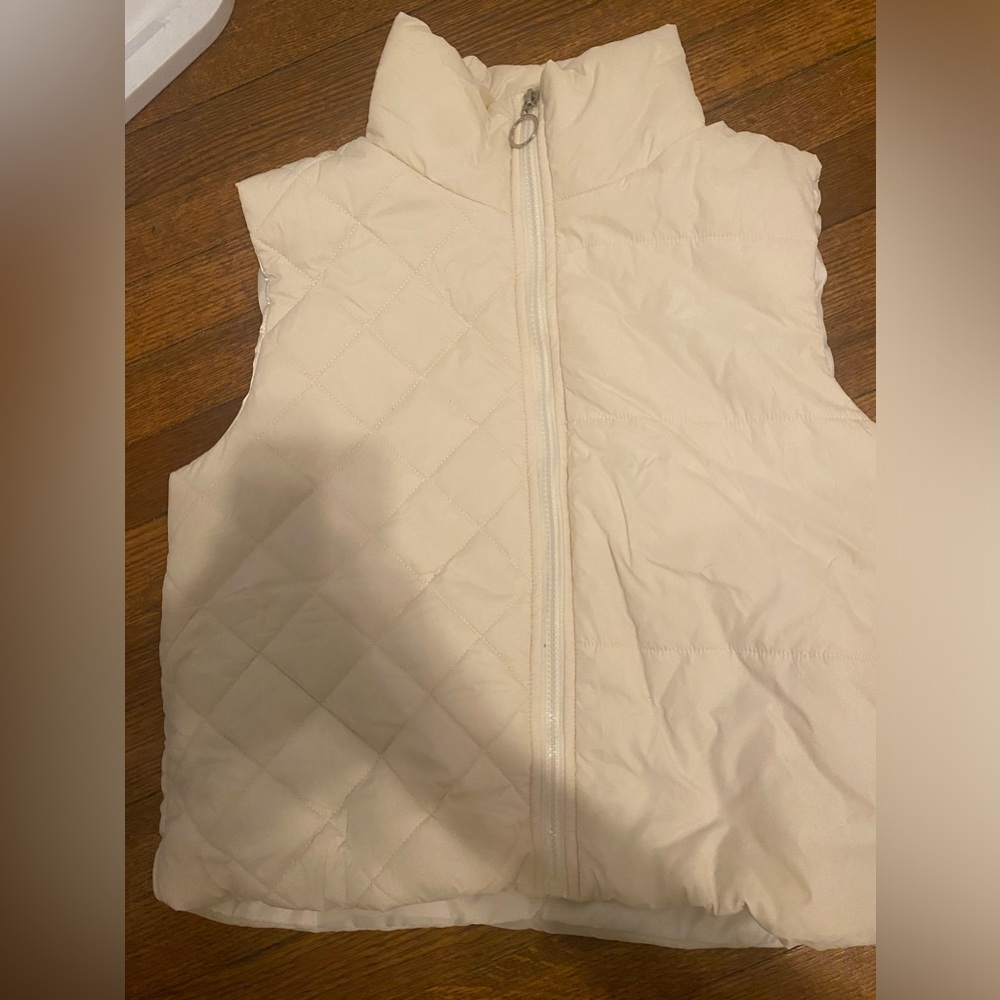 Cream puffer vest